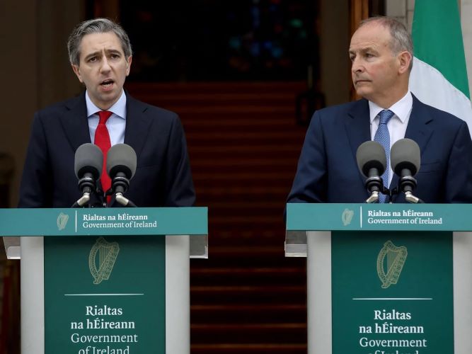 Ireland's Prime Minister Simon Harris (left), flanked by Ireland's Minister of Foreign Affairs Micheal Martin,